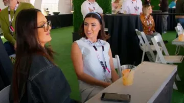 Versace Damier Check Duchesse Satin Crop Top worn by Bronwyn Newport as seen in The Real Housewives of Salt Lake City (S05E09)