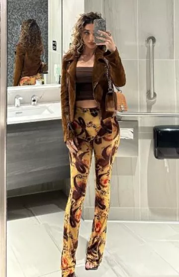 Chanel Boy Old Medium, 21K Caramel Brown Caviar Leather with Gold Hardware worn by Chantel Jeffries on her Instagram Story on November 18, 2024
