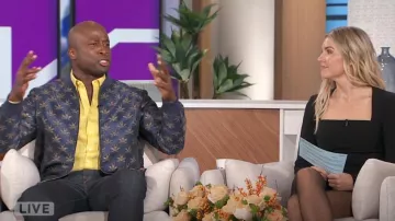 Paisley & Gray Hyde Bomber Jacket worn by Akbar Gbaja-Biamila as seen in The Talk on November 18, 2024