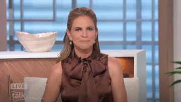 Lily Silk Sleeveless Tie-Neck Silk Blouse in Chocolate worn by Natalie Morales as seen in The Talk on  November 21, 2024