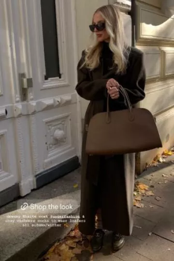 Manteau en laine Khaite Lea porté par Leonie Hanne sur sa Story Instagram le 3 novembre 2024