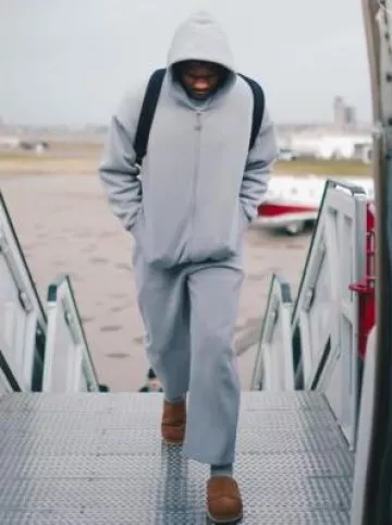 UGG Chestnut Brown Classic Slip Ons worn by Anthony Edwards on the Instagram account @timberwolves