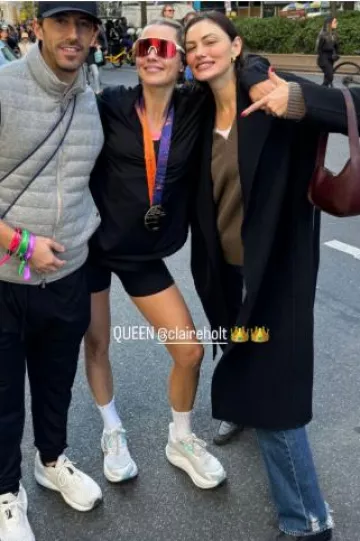 Reformation Jadey Cashmere Sweater worn by Phoebe Tonkin in New York on November 3, 2024