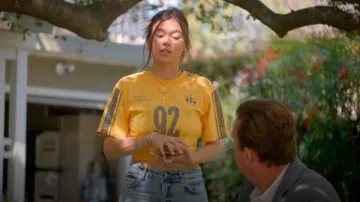 Urban Outfitters Sporty Cinched Baby Tee worn by Alice (Lukita Maxwell) as seen in Shrinking (S02E05)