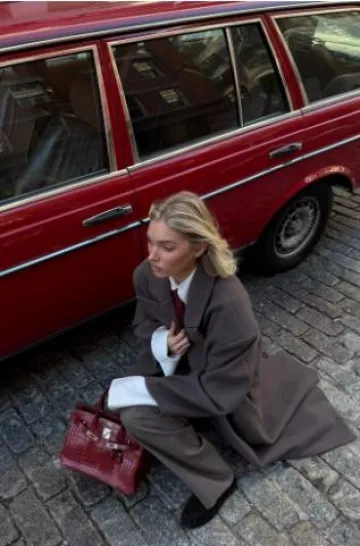 Hermes Burgandy Crocodile Birkin worn by Elsa Hosk on her Instagram Story on November 23, 2024