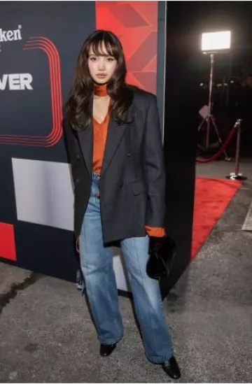 Ferrari Bag in Glossy Brushed Leather worn by Lisa at F1 Grand Prix of Las Vegas on November 23, 2024