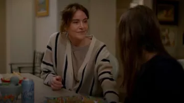 La Ligne Playa Cashmere Knit Heather Cream Tan Navy Stripe Cardigan worn by Liz (Christa Miller) as seen in Shrinking (S02E08)