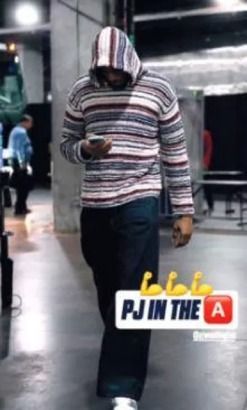 Louis Vuitton White & Blue Denim LV Trainer Sneakers worn by Paul Jamaine Washington Jr. on the Instagram account @memgrizz