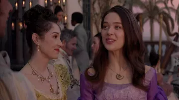 Outfits of The Little Mermaid: Vanessa (Jessica Alexander) wears Purple Long Dress in the movie