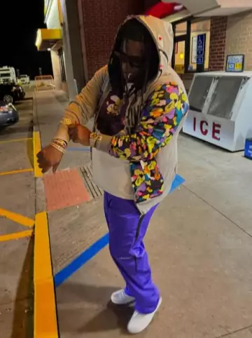 Bape White & Purple Camo Big Ape Head T Shirt porté par Big Homiie G sur le compte Instagram @bighomiieg