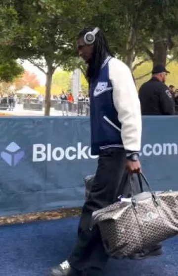 Goyard Grey Ambassade Bag worn by CeeDee Lamb on the Instagram account @dallascowboys