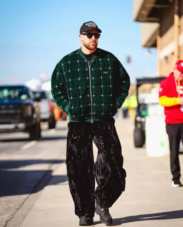 Kith Green Velvet Beaded Bomber Jacket worn by Travis Kelce on the Instagram account @chiefs