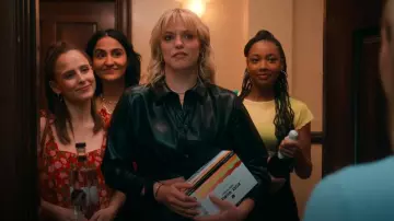 Alice And Olivia Faux Leather Twist Front Top worn by Leighton Murray (Reneé Rapp) as seen in The Sex Lives of College Girls (S03E02)