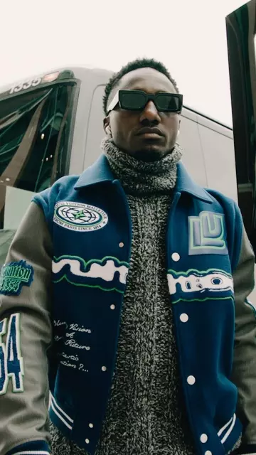 Louis Vuitton Blue & Dark Grey LV Bouclette Varsity Jacket worn by Deebo Samuel on the Instagram account @49ers