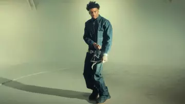 FCTRY LAb x NLE Choppa Black Rubber Boots worn by NLE Choppa in Finesse2tymes - Very Demure ft. NLE Choppa [Official Music Video]