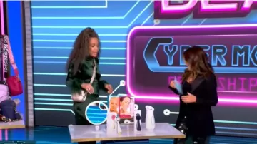 LaPointe Pleated Satin straight-leg Pants worn by Sunny Hostin as seen in The View on December 2, 2024