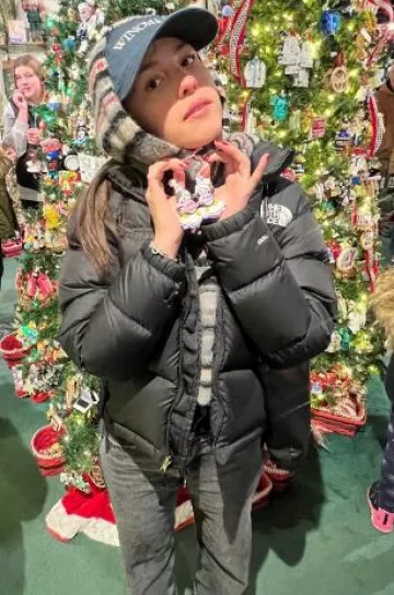 Ganni Grey Striped Soft Wool Scarf worn by Olivia Rodrigo on her Instagram Story on December 1, 2024