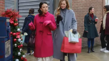Outfits of Sugarplummed: Janel Parrish wears Pink Bow Coat to play Sugarplum in the movie