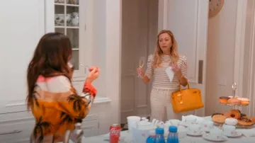 Frame Ruched Sleeve Cashmere Sweater worn by Sutton Stracke as seen in The Real Housewives of Beverly Hills (S14E03)
