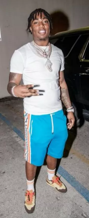 Gucci Turquoise & Orange Logo Stripe Shorts worn by Fredo Bang on the Instagram account @fredobang