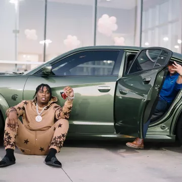 Gucci Black Cut Out GG Rubber Slides worn by Fredo Bang on the Instagram account @fredobang