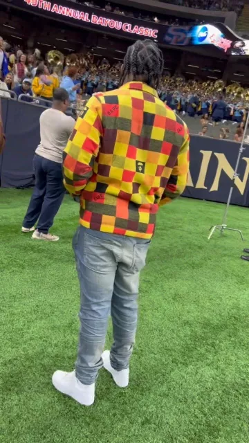 Bape Orange Block Check Shirt Jacket worn by Fredo Bang on the Instagram account @fredobang