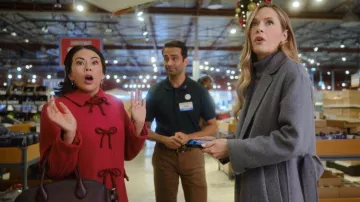 Outfits of Sugarplummed: Emily (Maggie Lawson) wears Long Coat in gray in the movie