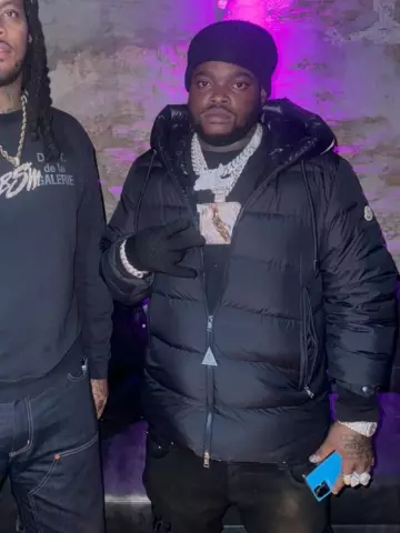 Moncler Black Waxed Staggered Logo Jeans worn by BossMan Dlow on the Instagram account @bossman_dlow