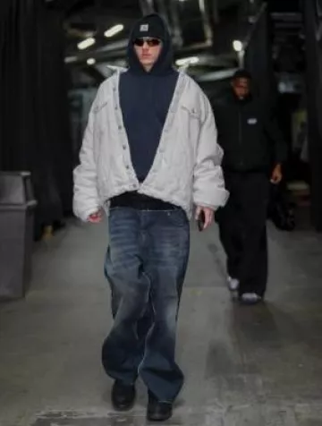 Nike Orange & Dark Grey Windtrack Sunglasses worn by Tyler Herro on the Instagram account @nbafashionfits