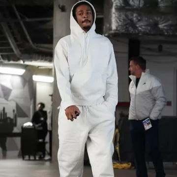 Nike Birch Grey Heather Solo Swoosh Hoodie worn by Temetrius Morant on the Instagram account @nbafashionfits