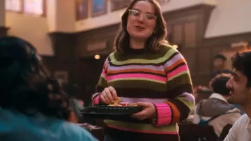 The looks of The Sex Lives of College Girls Season 3: Carla (Isabella Roland) wears a multicolored striped sweater
