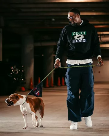 Gucci Black Shadow Logo Print Hoodie worn by Bam Adebayo on the Instagram account @miamiheat