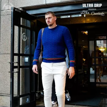Gucci Navy & Web Trim Cable Knit Sweater worn by Nikola Jokić on the Instagram account @nuggets