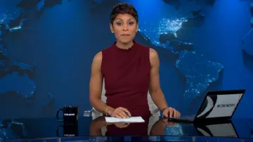 Black Halo Corinne Sleeveless Flared-Leg Jumpsuit worn by Jericka Duncan as seen in CBS Evening News on  December 2, 2024