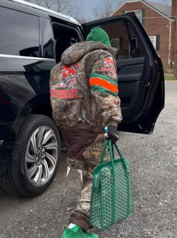 Goyard Green Bourgogne Tote Bag worn by DaBaby on the Instagram account @dababy