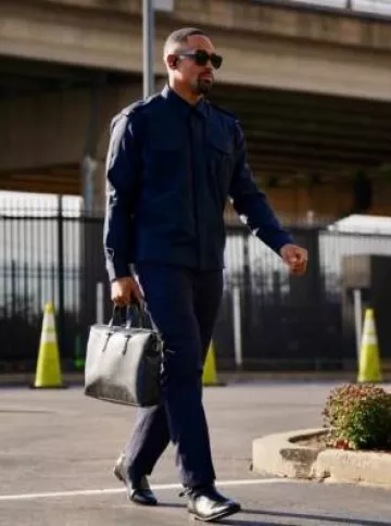 Louis Vuitton Black Monogram Explorer Briefcase worn by Jalen Hurts on the Instagram account @nfl