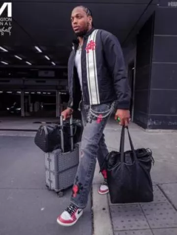 Jordan 1 Retro High Trophy Room worn by Derrick Henry on the Instagram account @ravens