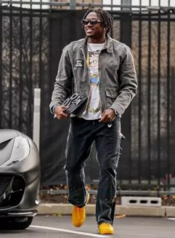 Nike Air Force 1 Low x Off White University Gold worn by A. J. Brown on the Instagram account @philadelphiaeagles