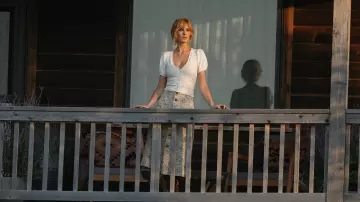 Wardrobe of Yellowstone Season 5:  Beth Dutton (Kelly Reilly) in wears White Cardigan in season 5, episode 14 of the TV series
