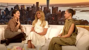 House of Harlow Tigers Eye Coin Earrings worn by Drew Barrymore as seen in The Drew Barrymore Show on December 13, 2024