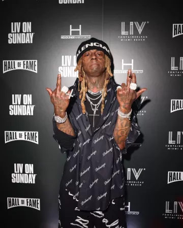Balenciaga Black & White Allover Script Logo Shirt worn by Lil Wayne on the Instagram account @livmiami