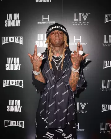Balenciaga Black & White Wide Logo Beanie worn by Lil Wayne on the Instagram account @livmiami