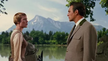 Outfits of The Sound of Music: Christopher Plummer wears Gray Wool Suit with Notched Lapel and Green Collar to portray Captain Georg von Trapp in the movie