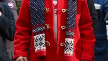 Arnold Schwarzenegger wears Santa Claus Red Wool Duffle-Coat on 'Man with the Bag' Set on December 17, 2024