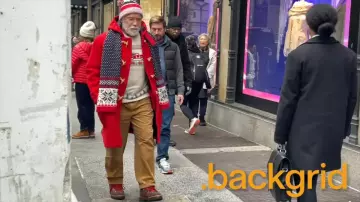 Arnold Schwarzenegger wears Santa Claus Red Wool Duffle-Coat on 'Man with the Bag' Set on December 17, 2024