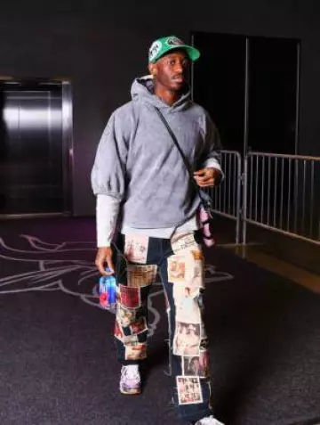 PDF Channel Faded Grey Layered Rocky Hoodie worn by Jordan Addison on the Instagram account @vikings