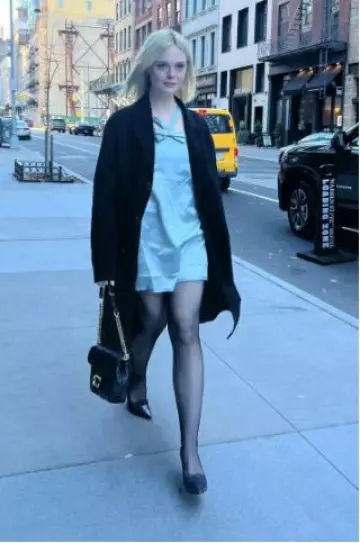 Coach Times Square Tabby Shoulder Bag 17 with Quilting worn by Elle Fanning at Good Morning America on December 13, 2024
