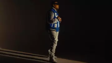 Politics Light Grey Faux Leather Stacked Cargo Pants worn by Finesse2tymes in Finesse2Tymes - Bigger Now ft. Hunxho [Official Music Video]