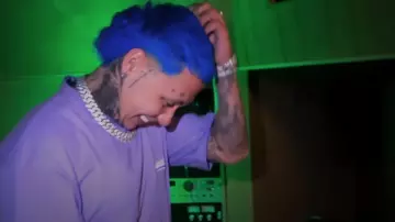 Balenciaga Political Campaign Oversized Logo Print T Shirt worn by Blessd in KAROL G, Feid, DFZM ft. Ovy On The Drums, J Balvin, Maluma, Ryan Castro, Blessd - +57