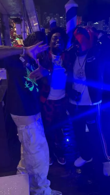 Palm Angels Black & Red Snake Print Trackpants worn by Kodak Black on the Instagram account @richthekid